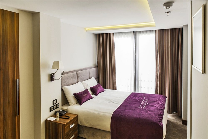 Imagen de la habitación del Hotel The 22. Foto 4