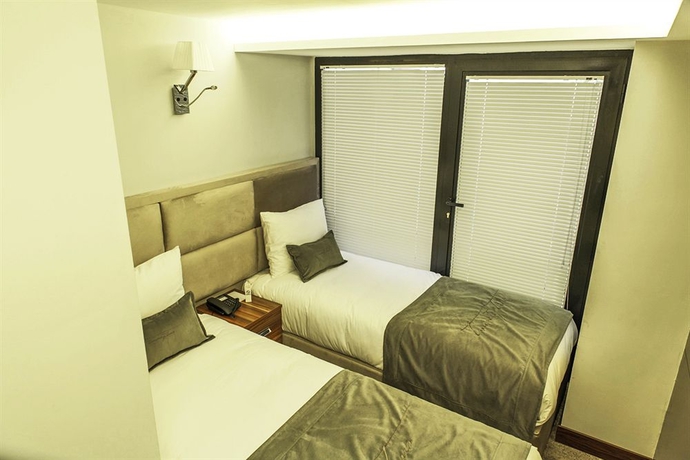 Imagen de la habitación del Hotel The 22. Foto 7