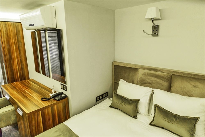 Imagen de la habitación del Hotel The 22. Foto 12