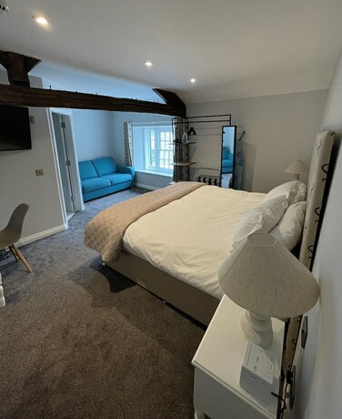 Imagen de la habitación del Hotel The 3 Millstones Inn. Foto 11