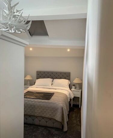 Imagen de la habitación del Hotel The 3 Millstones Inn. Foto 19