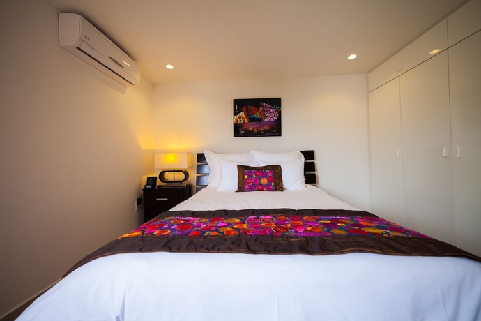 Imagen de la habitación del Hotel The 5th Avenue. Foto 15