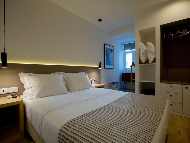 Imagen de la habitación del Hotel The 8 Downtown Suites. Foto 14