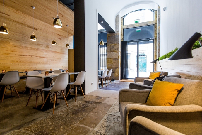 Imagen del bar/restaurante del Hotel The 8 Downtown Suites. Foto 4