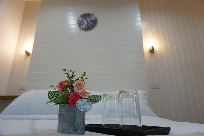Imagen de la habitación del Hotel The Aam Resort Bang Sa-Re. Foto 11