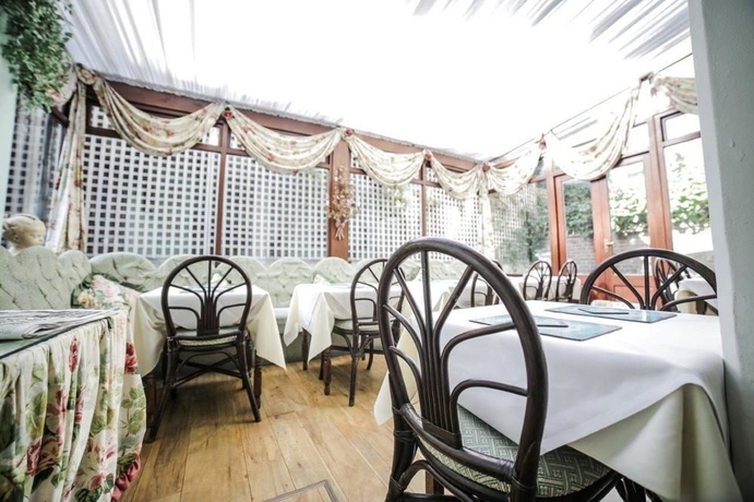 Imagen del bar/restaurante del Hotel The Abbey Court Notting Hill. Foto 6