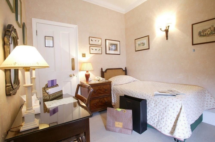 Imagen de la habitación del Hotel The Abbey Court Notting Hill. Foto 11