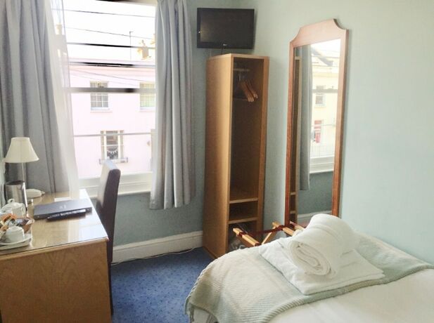 Imagen de la habitación del Hotel The Abbey. Foto 12