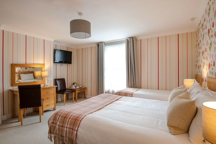 Imagen de la habitación del Hotel The Abbey. Foto 15