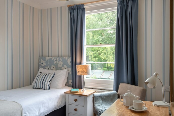 Imagen de la habitación del Hotel The Abbey. Foto 17