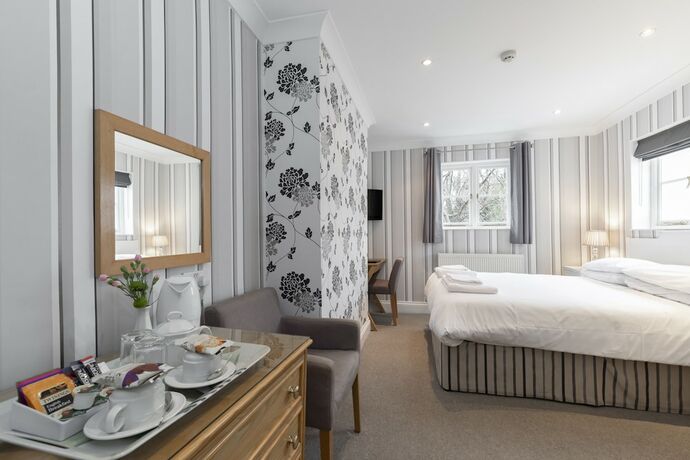 Imagen de la habitación del Hotel The Abbey. Foto 19