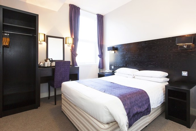 Imagen de la habitación del Hotel The Abbey Lodge. Foto 6