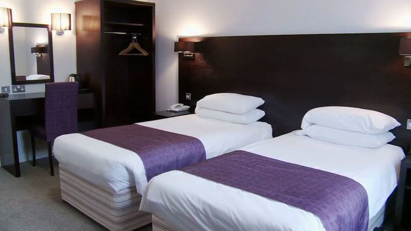 Imagen de la habitación del Hotel The Abbey Lodge. Foto 15