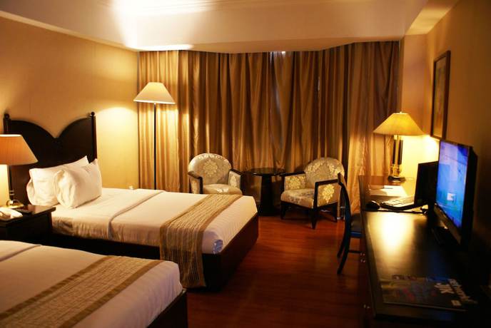 Imagen de la habitación del Hotel The Acacia Jakarta. Foto 6