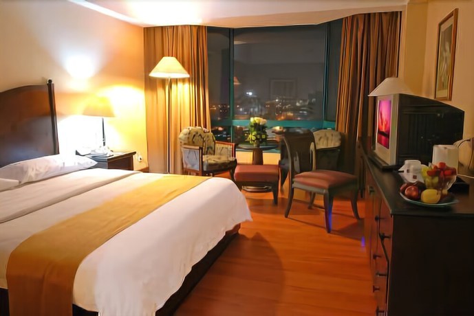 Imagen de la habitación del Hotel The Acacia Jakarta. Foto 9