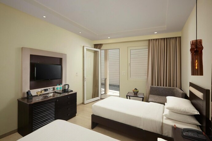 Imagen de la habitación del Hotel The Acacia Morjim. Foto 19