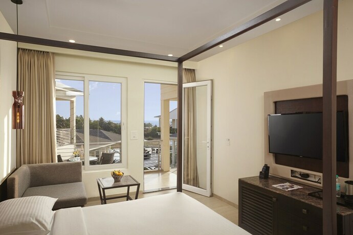 Imagen de la habitación del Hotel The Acacia Morjim. Foto 20