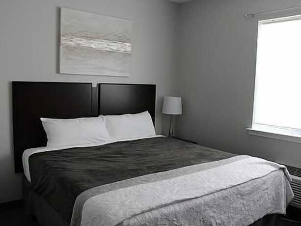 Imagen de la habitación del Hotel The Acorn Suites. Foto 17