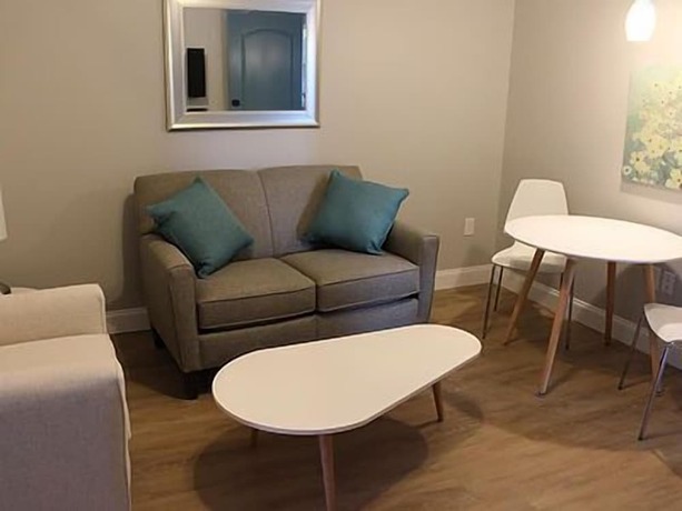 Imagen de la habitación del Hotel The Acorn Suites. Foto 18