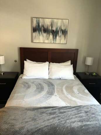 Imagen de la habitación del Hotel The Acorn Suites. Foto 19