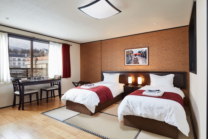 Imagen de la habitación del Hotel The Address Akakura. Foto 1