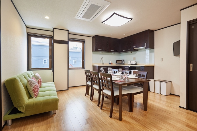 Imagen de la habitación del Hotel The Address Akakura. Foto 15