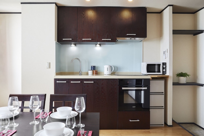 Imagen de la habitación del Hotel The Address Akakura. Foto 16