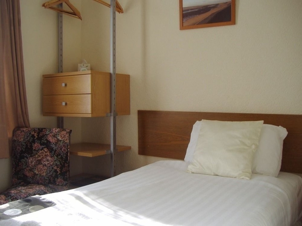 Imagen de la habitación del Hotel The Address. Foto 7