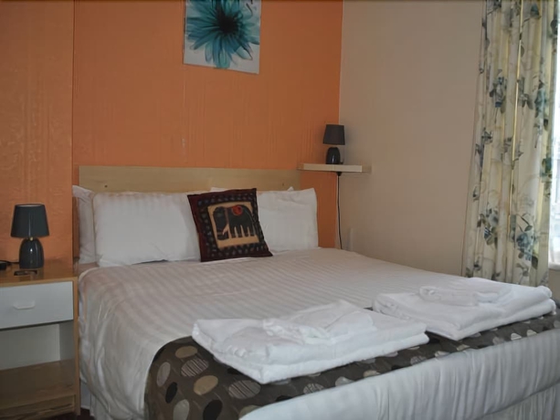 Imagen de la habitación del Hotel The Address. Foto 16