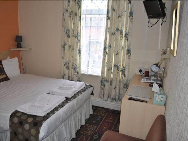 Imagen de la habitación del Hotel The Address. Foto 17