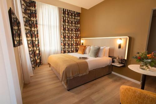 Imagen de la habitación del Hotel The Address Glasgow. Foto 19