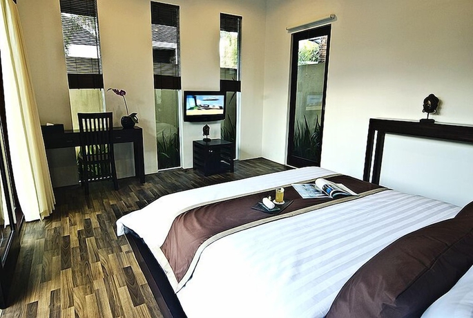 Imagen de la habitación del Hotel The Adnyana Villas and Spa. Foto 9