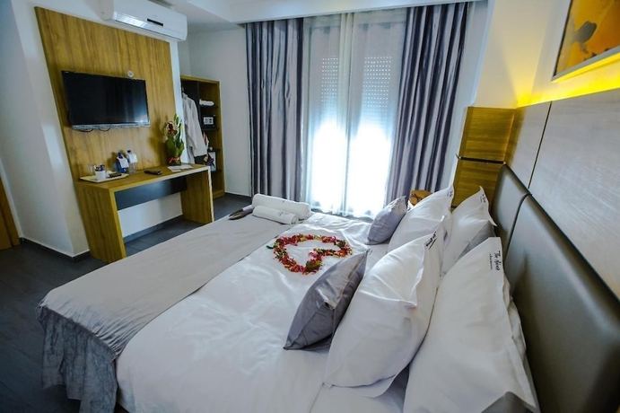 Imagen de la habitación del Hotel The Adress Residence. Foto 11