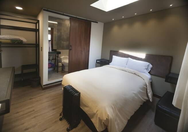 Imagen de la habitación del Hotel The Adventure Brew Hostel. Foto 15
