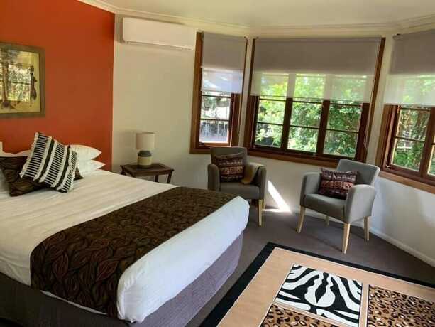 Imagen de la habitación del Hotel The African Village. Foto 11