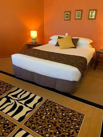 Imagen de la habitación del Hotel The African Village. Foto 13