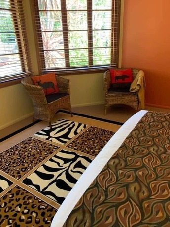 Imagen de la habitación del Hotel The African Village. Foto 17