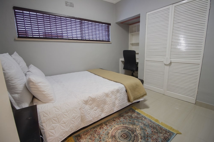 Imagen de la habitación del Hotel The Afropolitan. Foto 5