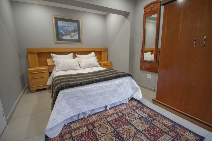 Imagen de la habitación del Hotel The Afropolitan. Foto 6