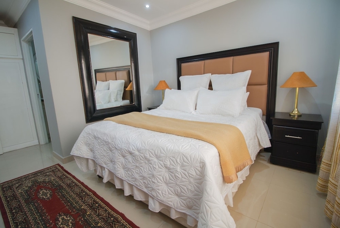 Imagen de la habitación del Hotel The Afropolitan. Foto 9