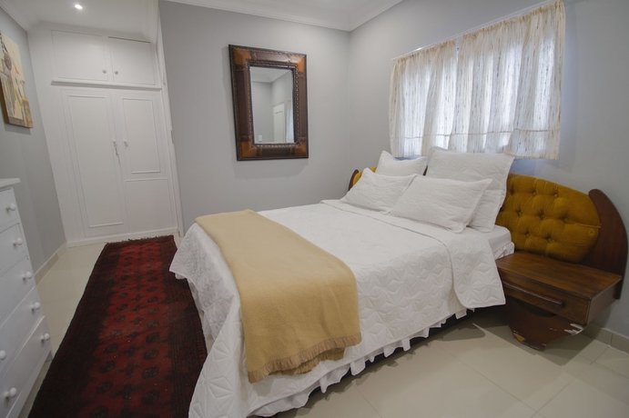 Imagen de la habitación del Hotel The Afropolitan. Foto 10