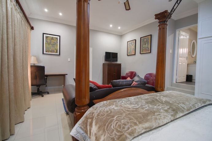 Imagen de la habitación del Hotel The Afropolitan. Foto 14