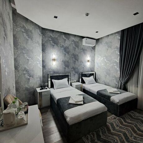 Imagen de la habitación del Hotel The Afrosiyob. Foto 17