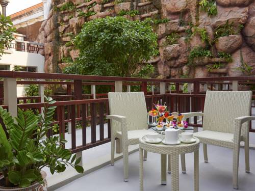 Imagen de la habitación del Hotel The Agate Pattaya Boutique Resort. Foto 13