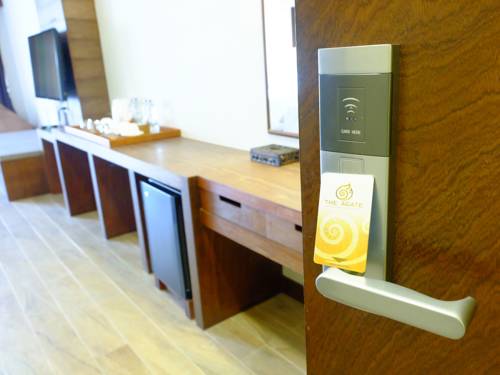 Imagen de la habitación del Hotel The Agate Pattaya Boutique Resort. Foto 16