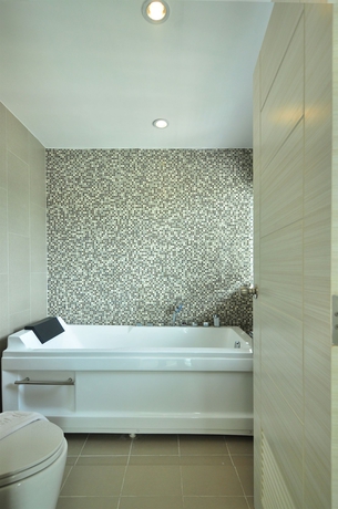 Imagen de la habitación del Hotel The Aim Patong. Foto 10