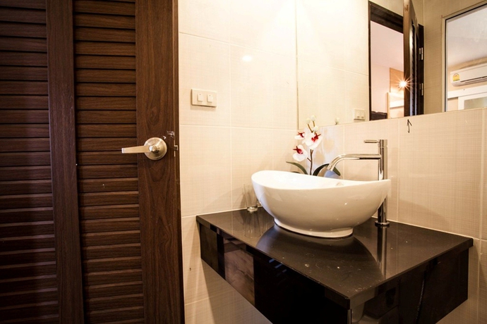 Imagen de la habitación del Hotel The Aim Sathorn. Foto 9