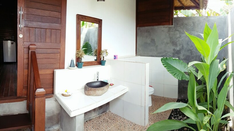 Imagen de la habitación del Hotel The Akah Cottage. Foto 26