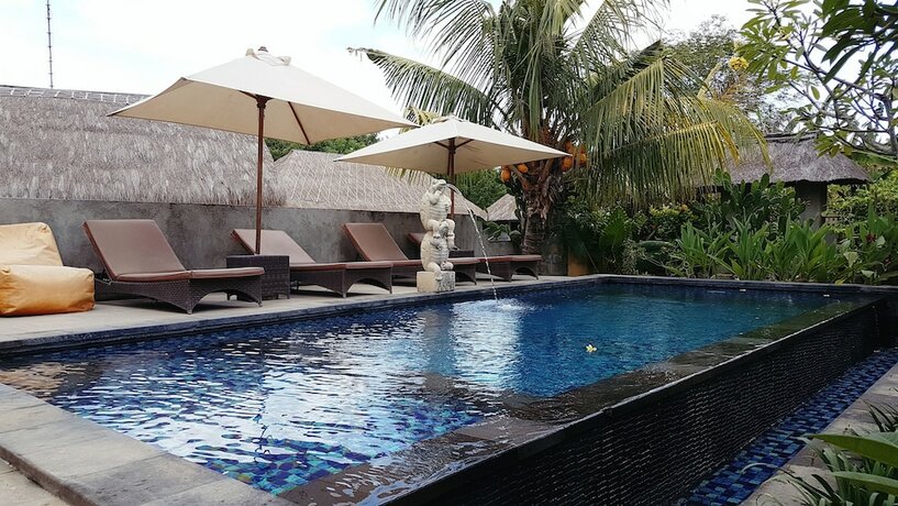 Imagen de la piscina del Hotel The Akah Cottage. Foto 35