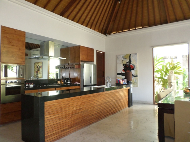 Imagen de la habitación del Hotel The Akasha Luxury Boutique Villas Seminyak. Foto 6